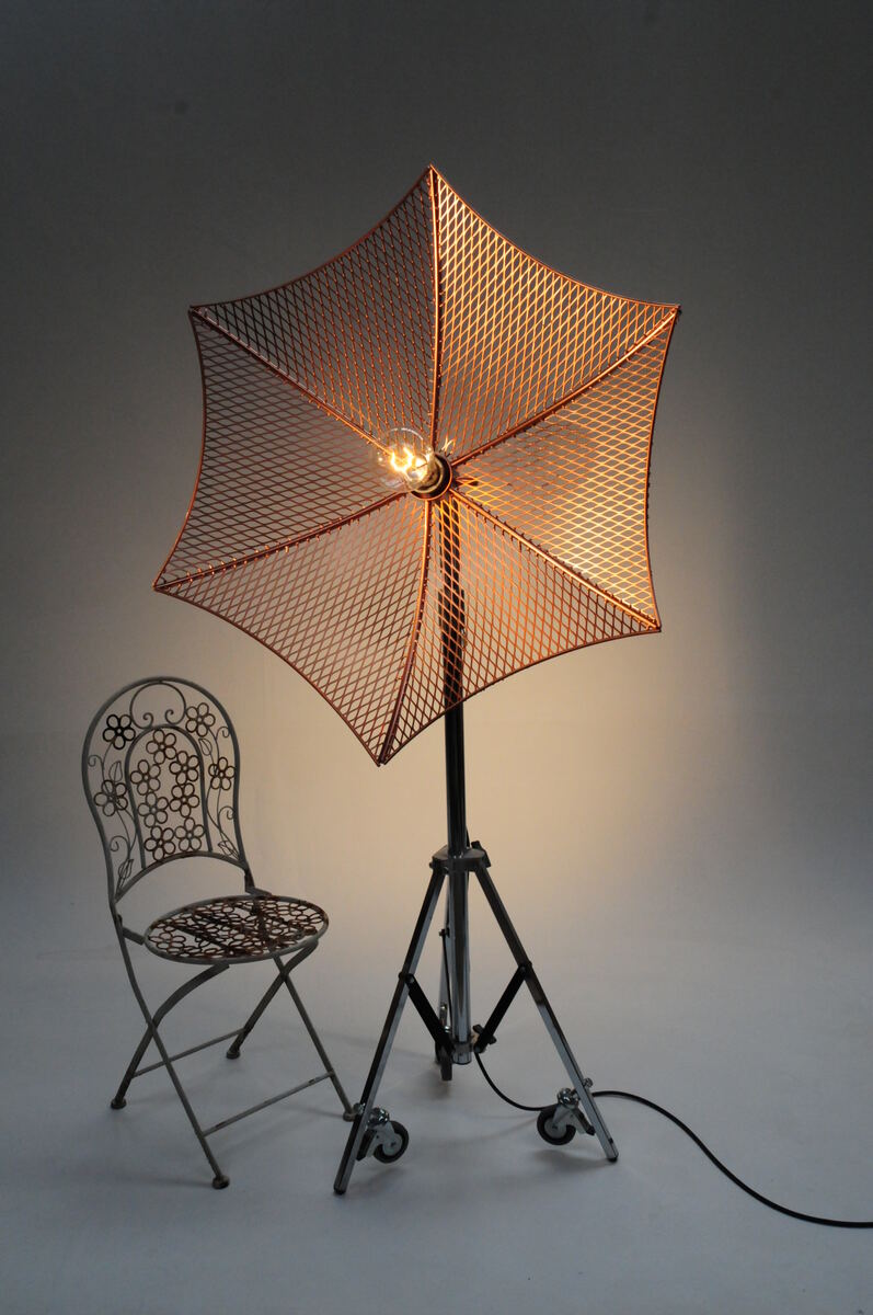 Copper mesh umbrella floor lamp on a tripod