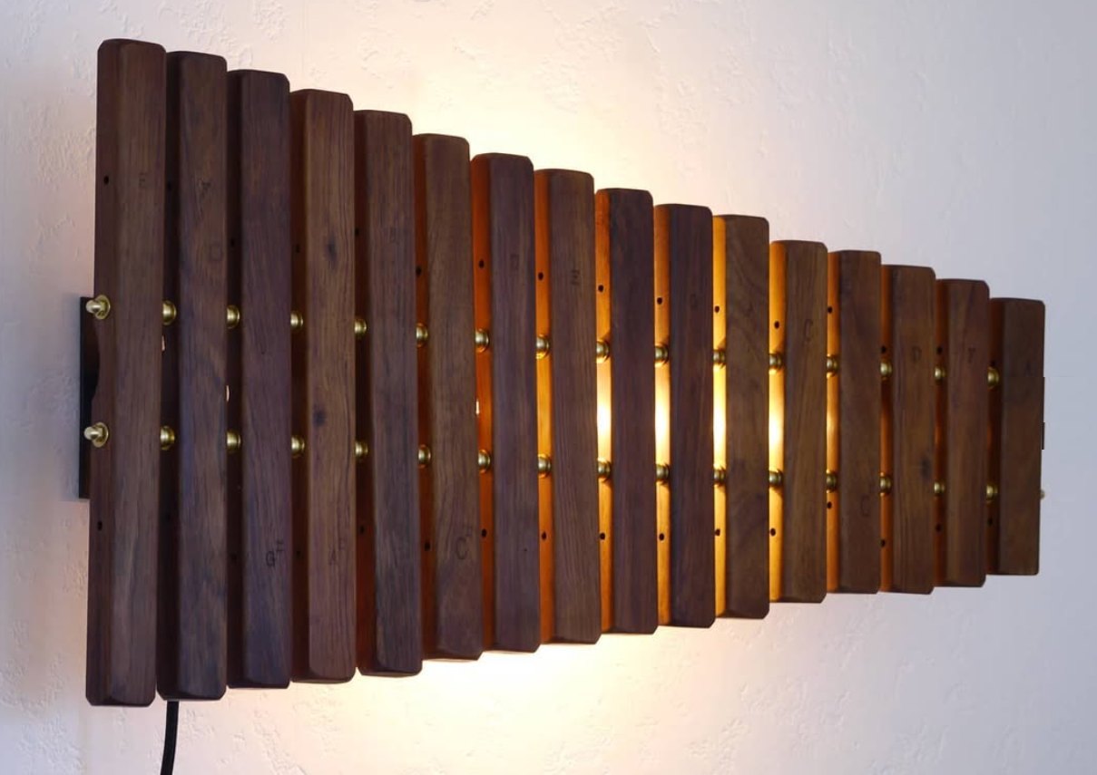 Hardwood xylophone converted into a wall light
