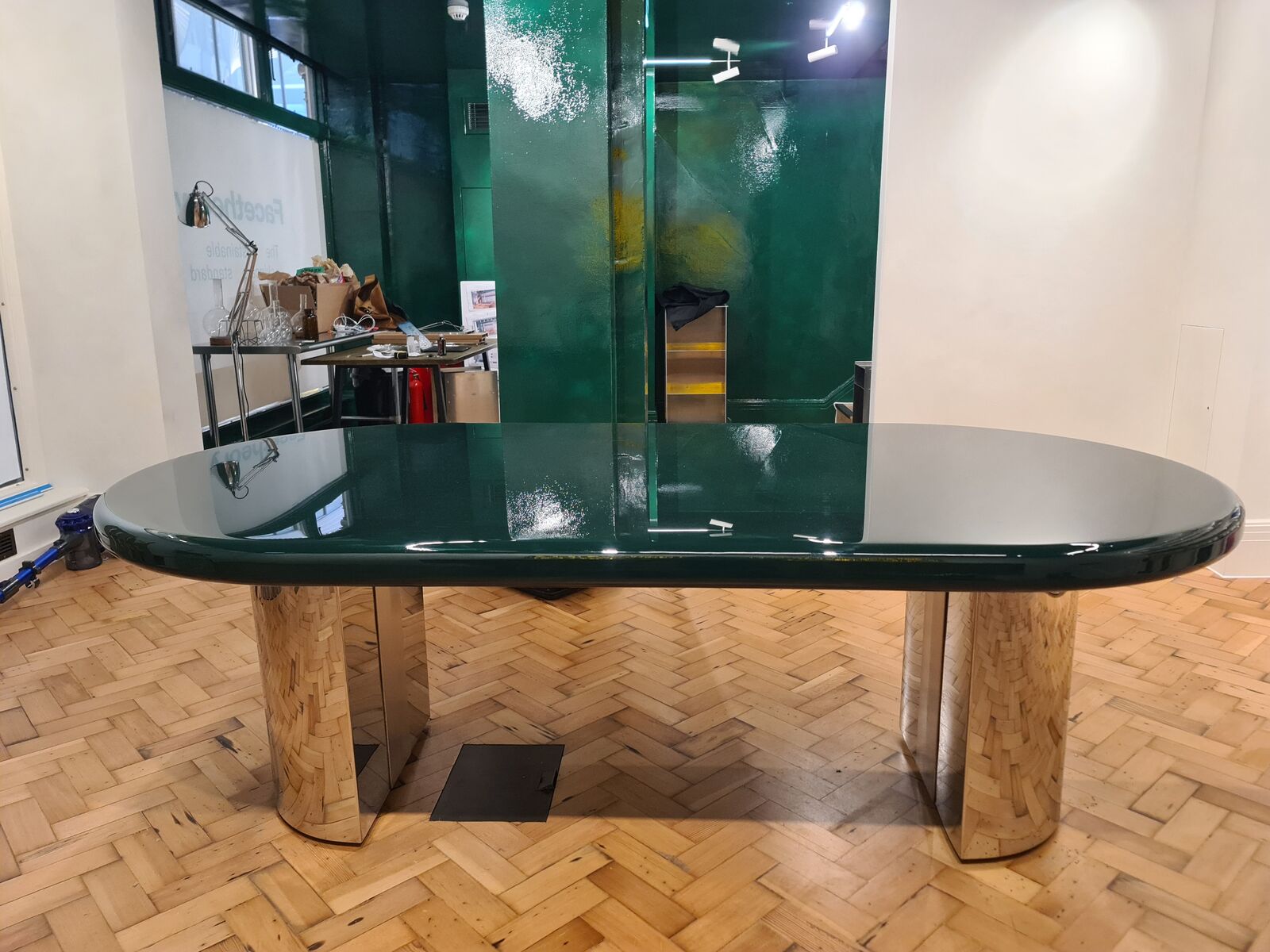 The shop floor with the table and glowing panels